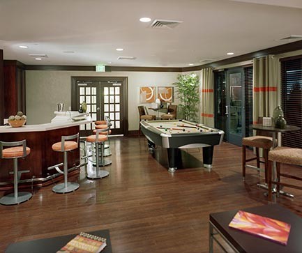 View of Palladian clubroom with billiards and bar area